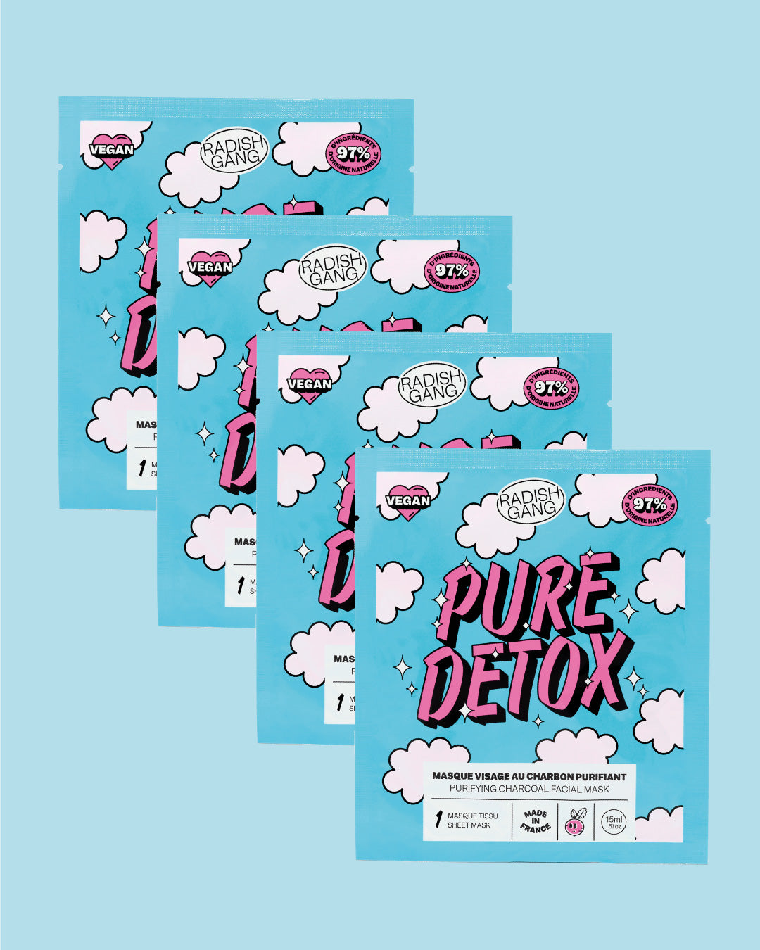 4 masques tissu Pure detox sur fond coloré