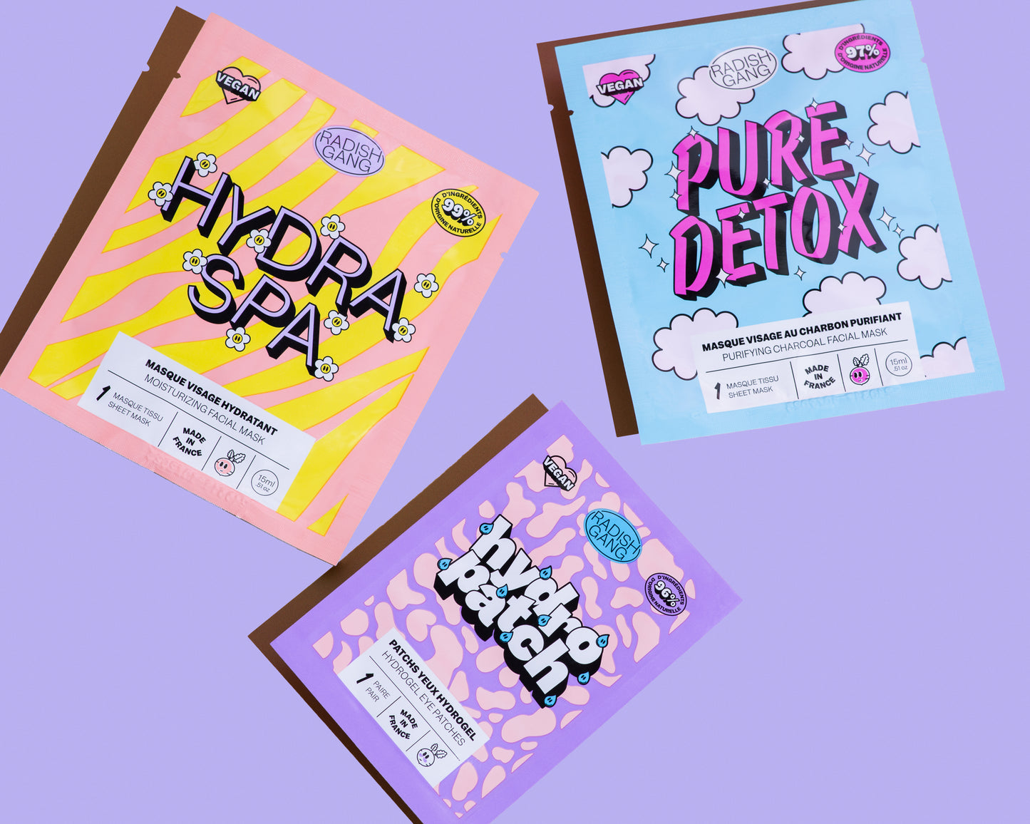 Présentation des trois masques Hydra spa, pure detox et hydro patch sur un fond coloré uni