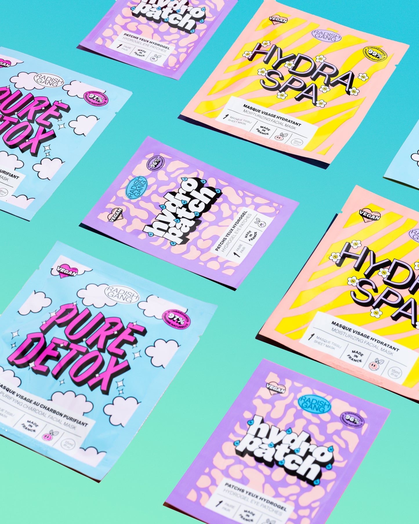pêle-mêle des packaging de la collection sur fond dégradé